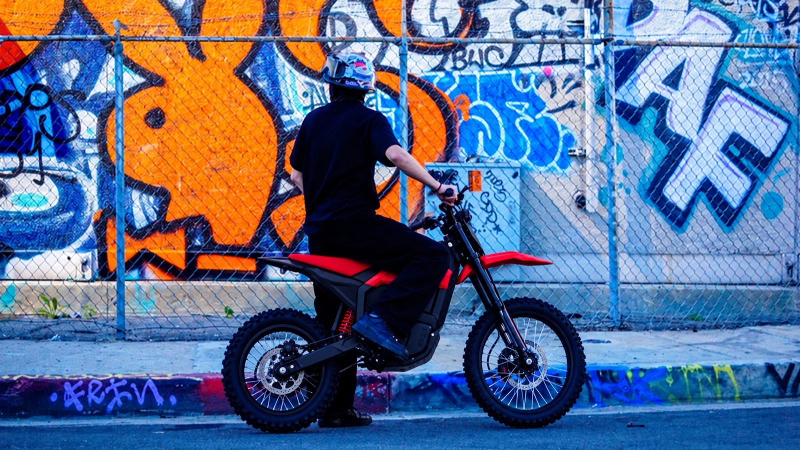 GoxRush electric dirt bike on open terrain at dusk